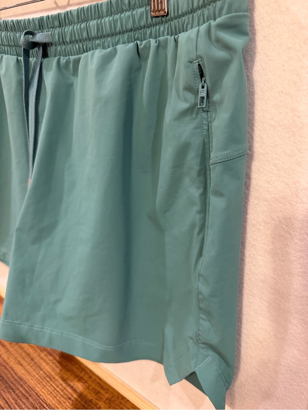 Fabletics Sea-foam Green Drawstring Workout Shorts with zipper pockets - Picture 3 of 13